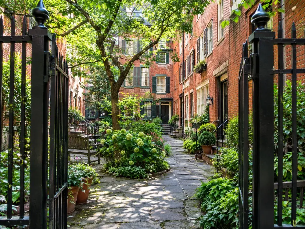 The gated court of 1854 brick row houses at Grove Court